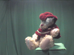 Teddy Bear Wearing Red Cape